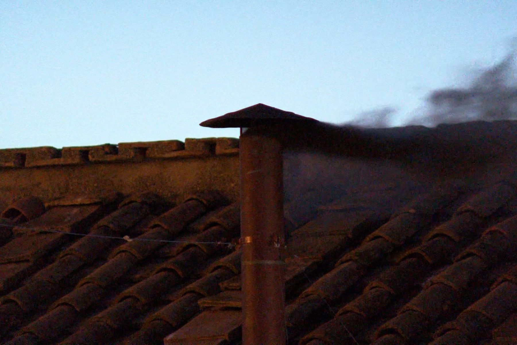 Black smoke signals end of first day of conclave